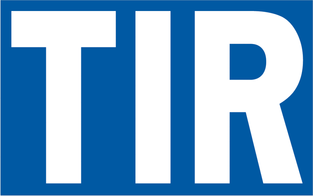 tabliczka z białym napisem TIR
