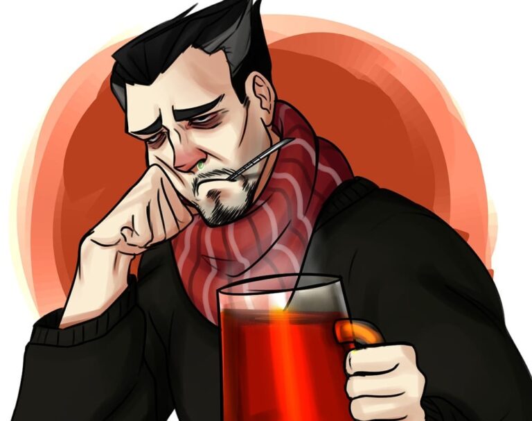 Mężczyzna w szaliku trzyma kubek herbaty, wygląda na chorego.